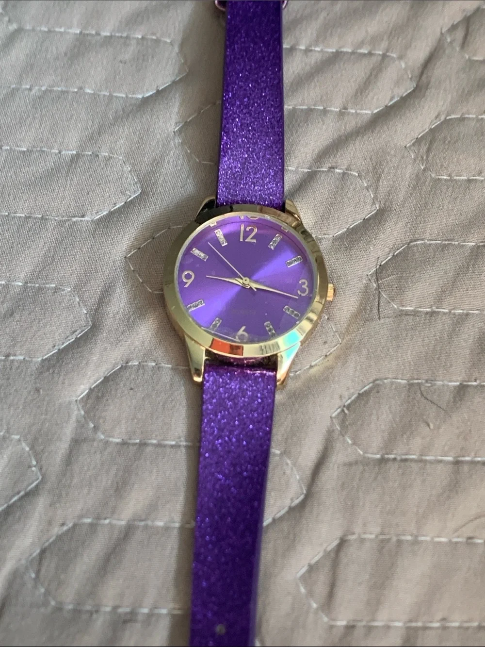 Women's Purple Glitter Strap Watch with Silver-Tone Case need battery